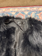 Cropped fur coat