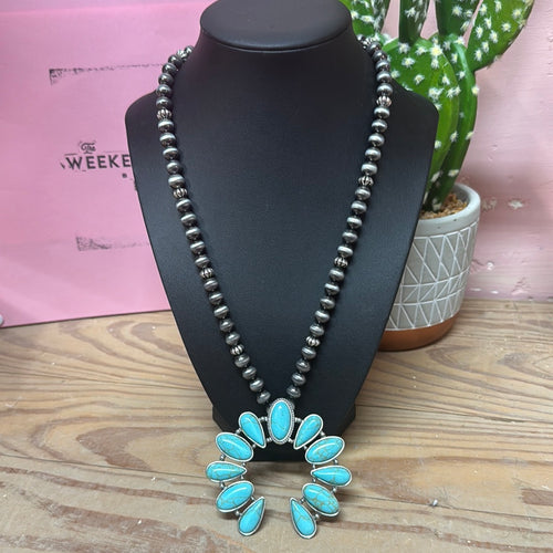 Faux turquoise squash pendent