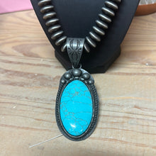 Faux turquoise pendent on navajo pearls necklace